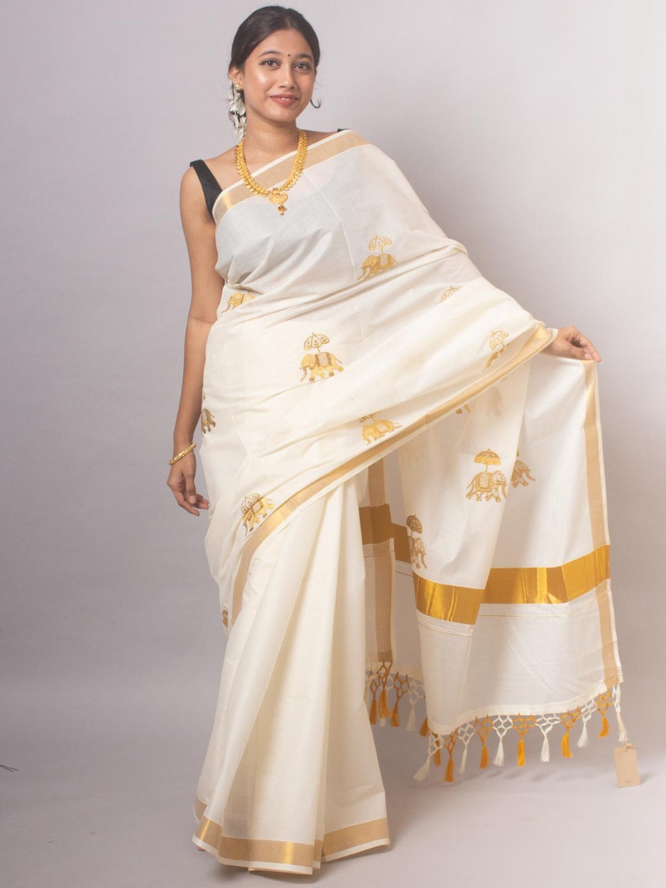 Kerala Saree with Embroidery in 
Golden Zari