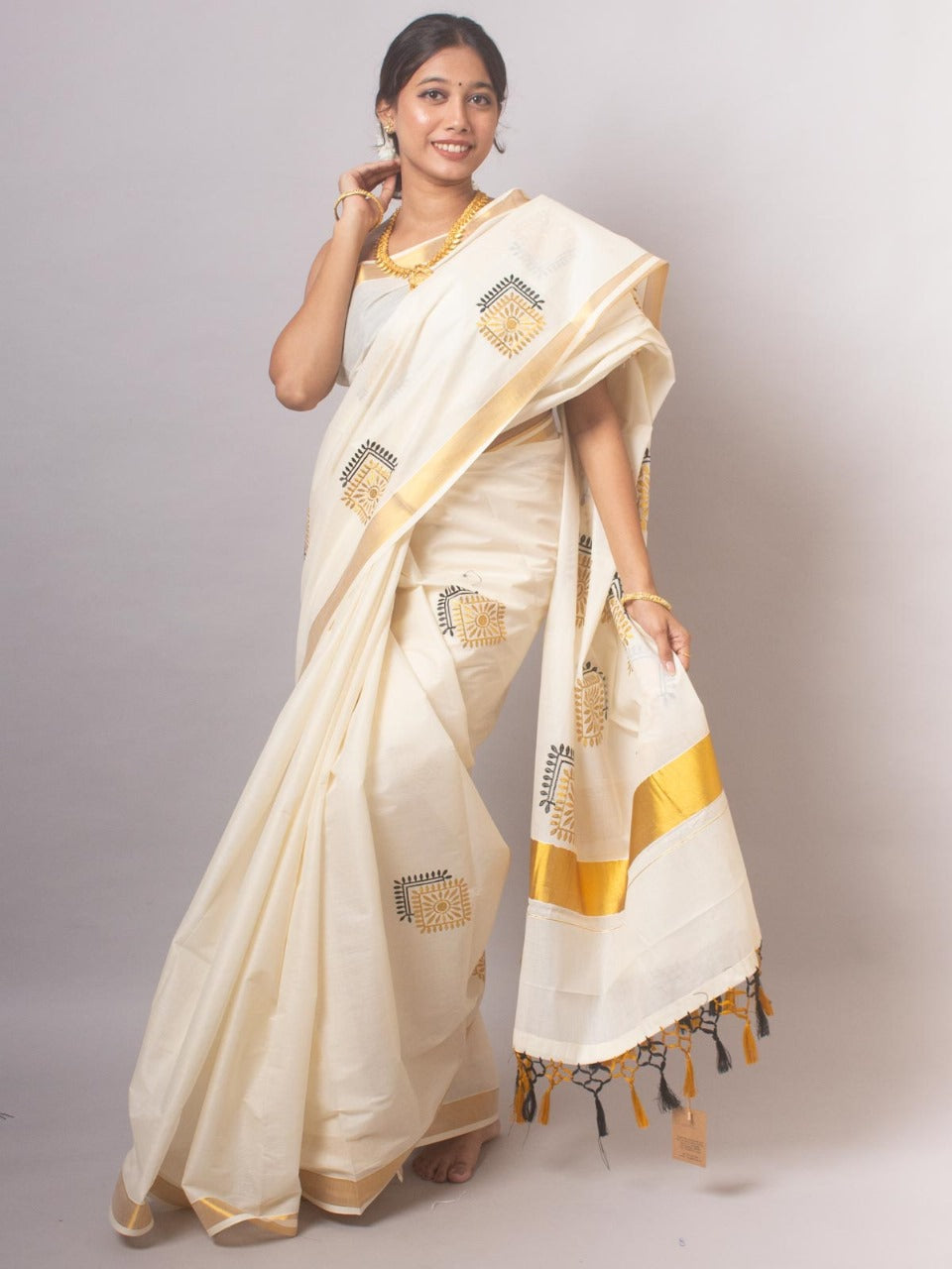 Kerala Saree with Embroidery in 
Golden Zari