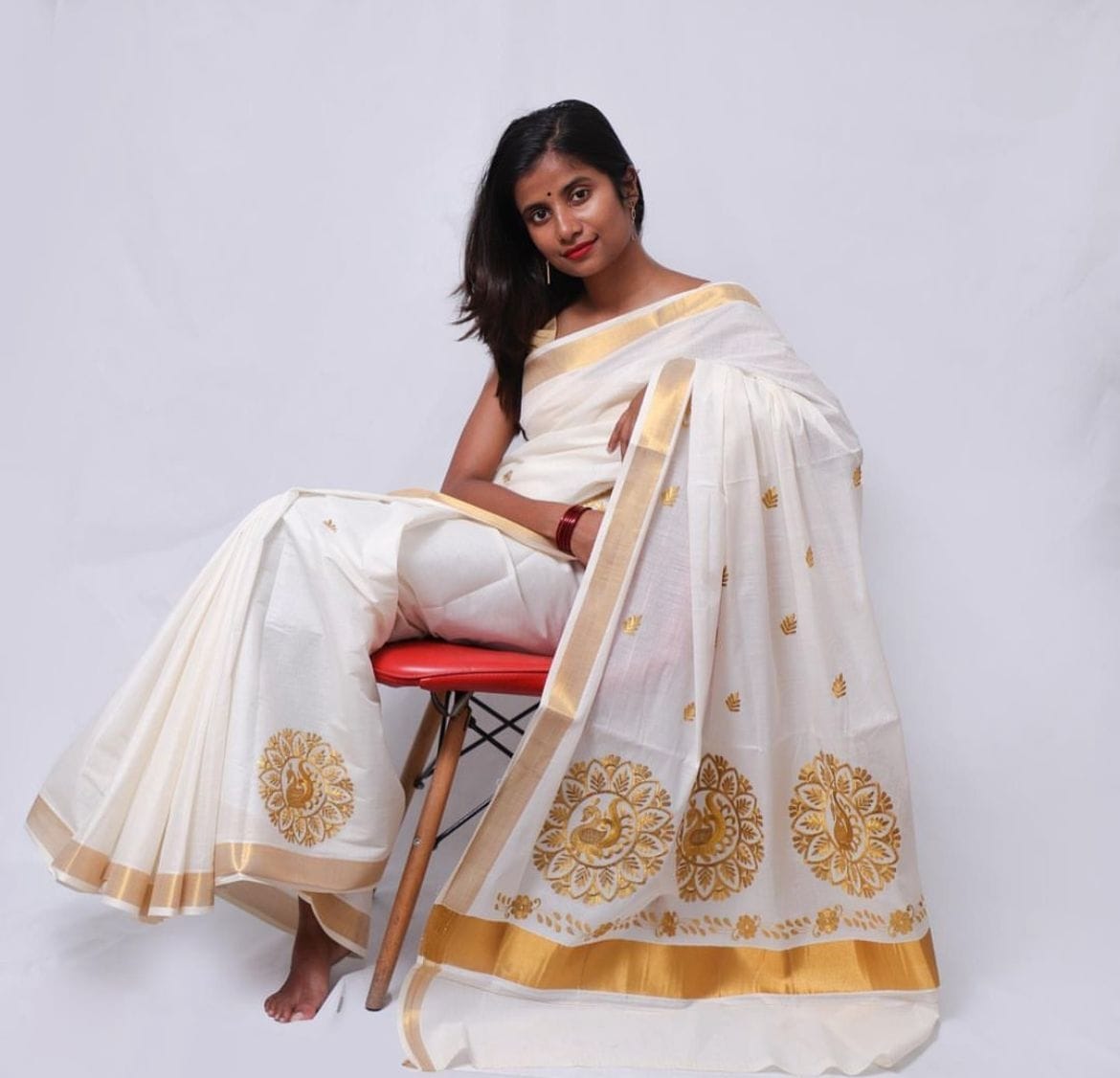 Kerala Saree with Embroidery in 
Golden Zari